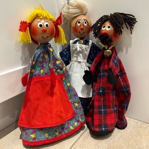 Wooden two faced happy sad puppets